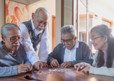 Group of seniors solving a puzzle