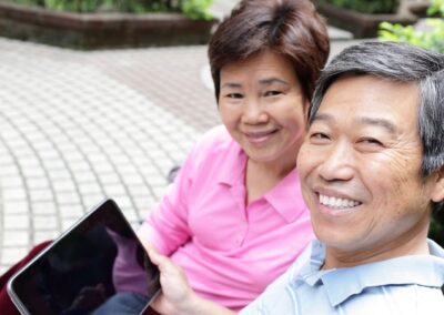 Senior couple looking at tablet together