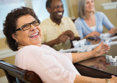 Group of seniors playing dominoes